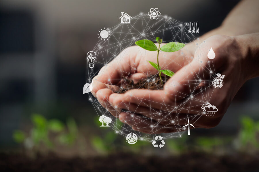 Hands,Using,Technology,Of,Renewable,Resources,To,Reduce,Pollution,And